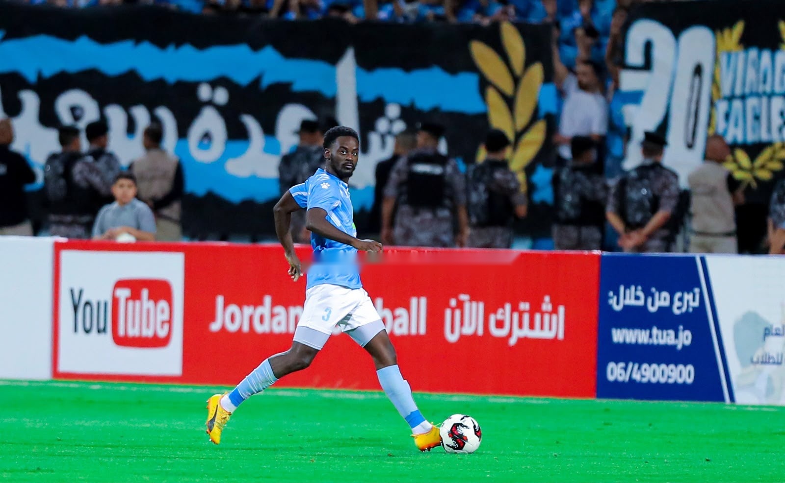 Football player with crowd behind